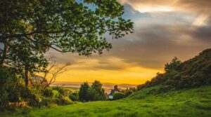 Peaceful rural village scene with fields - best natural photography and countryside landscape photography